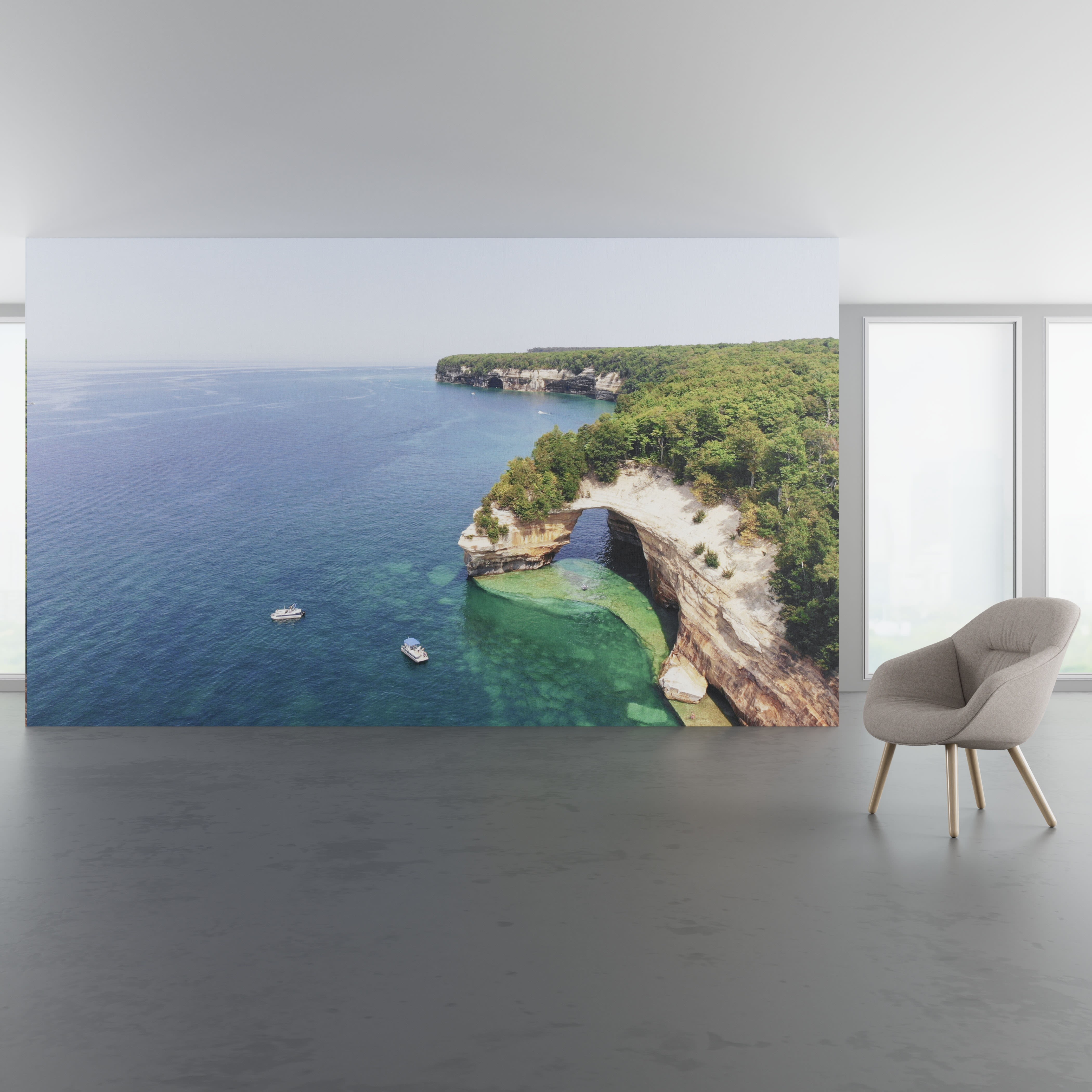 Install scene of Pictured Rocks, a digital art wallcovering pattern featuring cliff landscape photography.