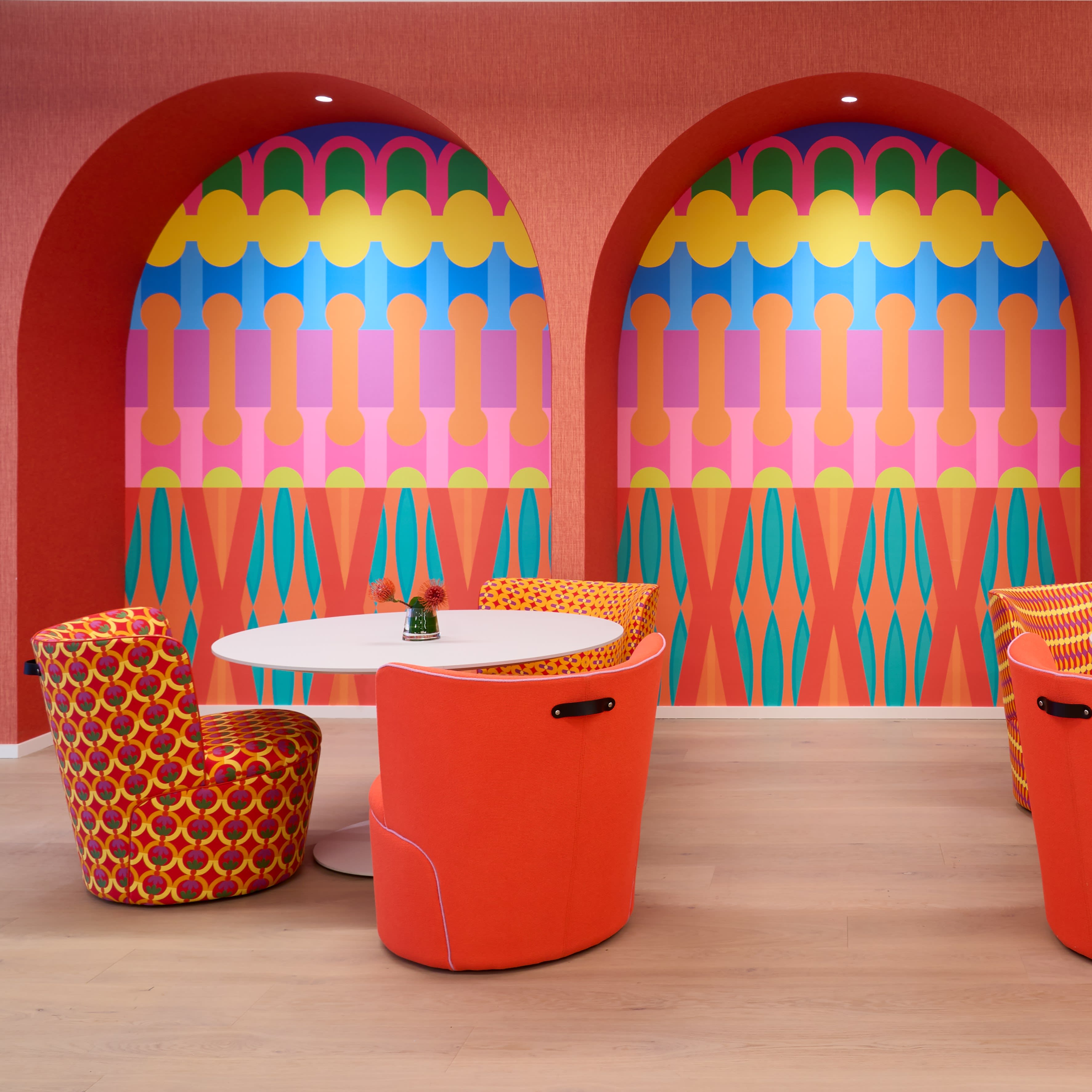 Momentum's showroom featuring Yinka Ilori's bold, colorful designs, highlighted as a top color psychology trend at NeoCon 2024